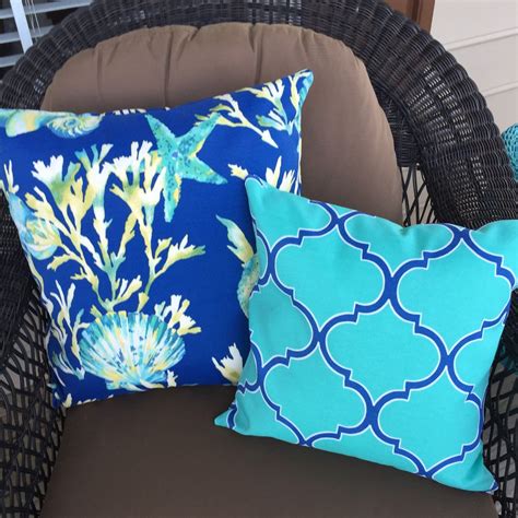 navy and turquoise throw pillows.